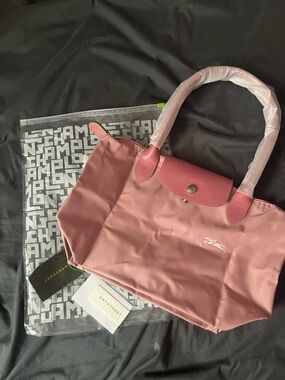 NWT Pink packable nylon champ bag medium size